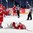 HELSINKI, FINLAND - DECEMBER 27: Artemi Chernikov #19 looks on as Ivan Kulbakov #31 is injured after leaving the bench and attempting to stop Slovakia from scoring an empty net goal during preliminary round action at the 2016 IIHF World Junior Championship. (Photo by Andre Ringuette/HHOF-IIHF Images)

